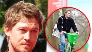 Joe Alwyn Looks Downcast Riding Bike the Day After Christmas in London