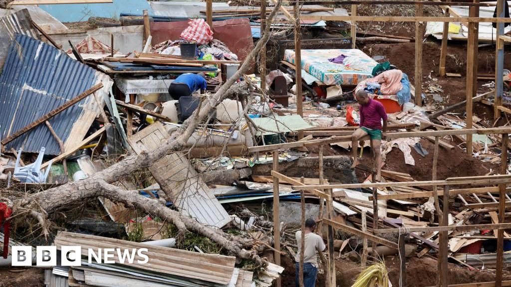 Macron visits Mayotte as thousand still missing after storm