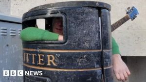 Charles Cavey has busked in a Cambridge litter bin for 25 years