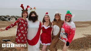 Hardy Suffolk swimmers enjoy a Christmas Day dip