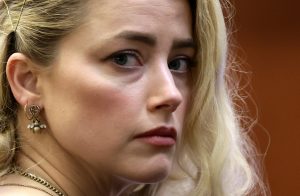 US actress Amber Heard waits before the jury announced a split verdict in favor of both Johnny Depp and Amber Heard on their claim and counter-claim in the Depp v. Heard civil defamation trial at the Fairfax County Circuit Courthouse in Fairfax, Virginia, on June 1, 2022.