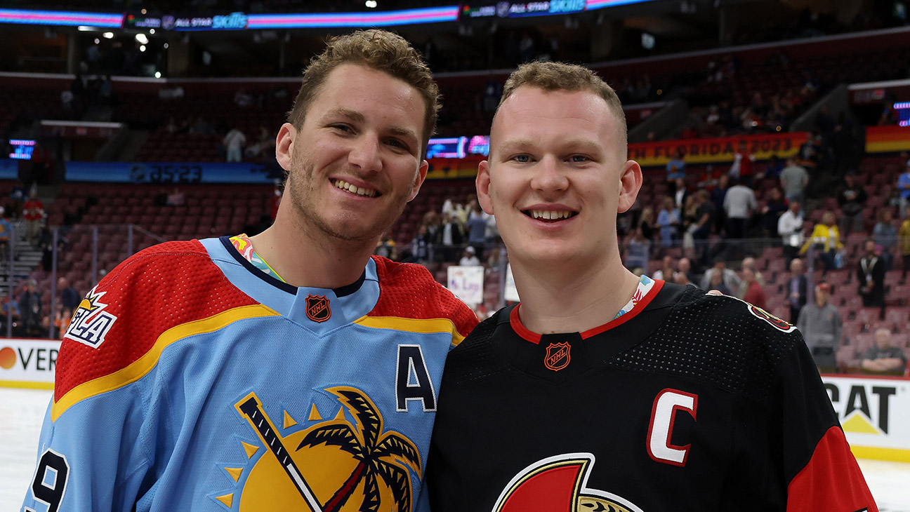 Brady Tkachuk #7 of the Ottawa Senators and Matthew Tkachuk #19 of the Florida Panthers pose together after the 2023 NHL All-Star Skills Competition at FLA Live Arena on February 03, 2023 in Sunrise, Florida.