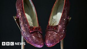 Dorothy's ruby slippers worn by Judy Garland sell for $28m at auction