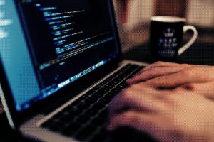 Typing at computer desk