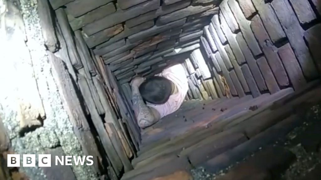 Man trying to escape police gets stuck in chimney