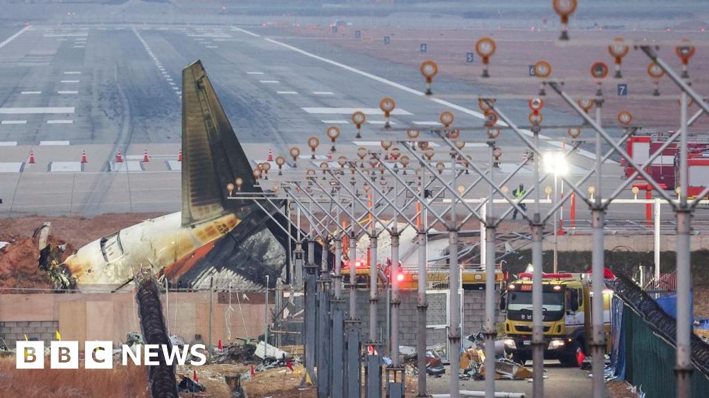 Why was there a wall near the runway?