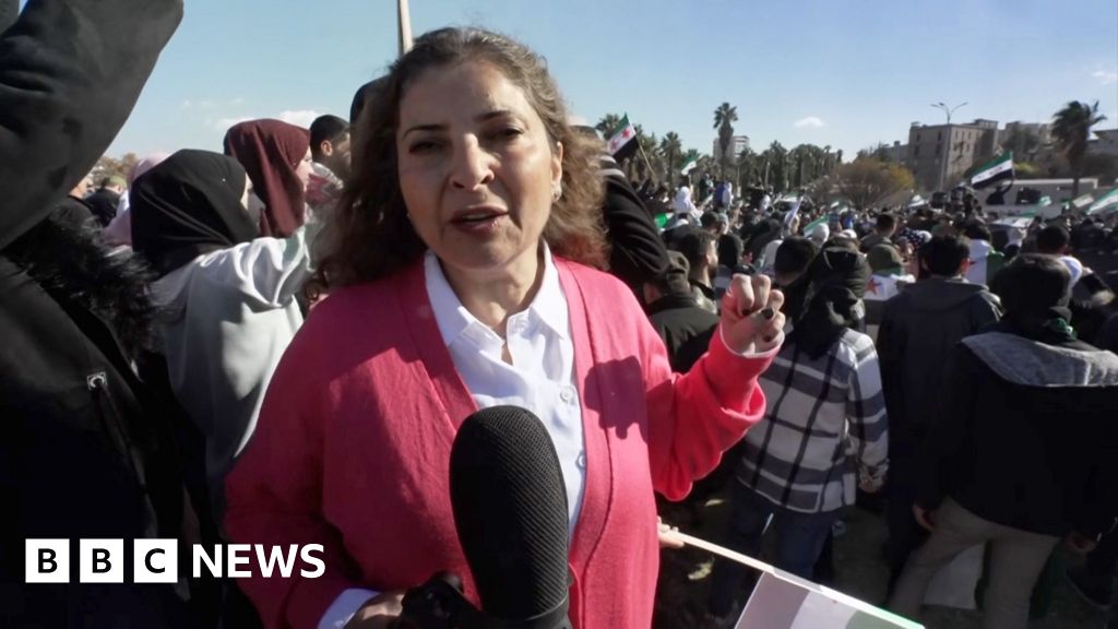 Songs and celebrations at Damascus rally