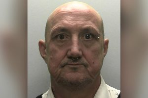 Bus driver who was reading peice of paper behind the wheel jailed over fatal collision