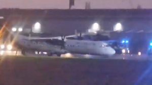 Plane's nose wheel collapses during hard landing in Belfast due to bad weather | UK News