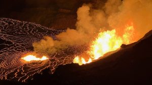 Lava erupts from vents on the west part of the caldera wall, feeding lava flows that cover the area of Halemaʻumaʻu crater during a new eruption within the summit caldera Kaluapele, which began early at the Kilauea volcano in Hawaii, U.S. December 23, 2024.  Pic: USGS/Reuters