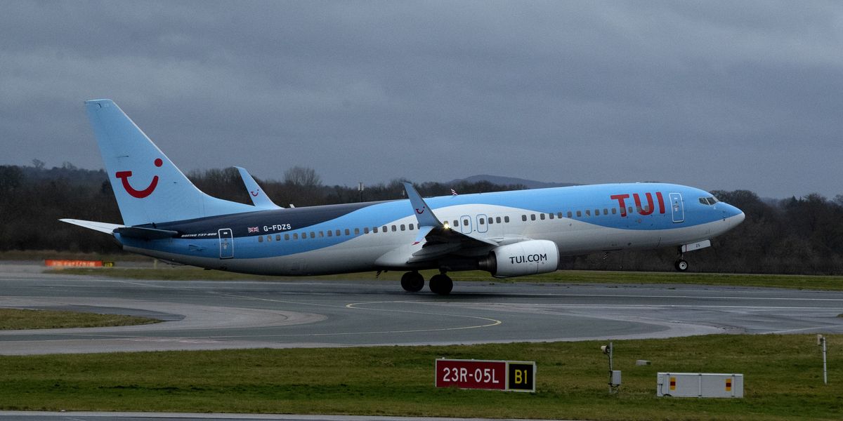 Tui cabin crew member rushed to hospital after 'falling from plane' as air ambulance called to airport