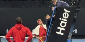 Australian Open match suspended after rowdy fans force players to abandon court