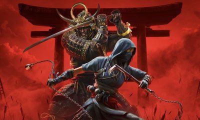 Assassin's Creed Shadows key art showing Naoe and Yasuke drawing weapons and standing side by side, against a red background