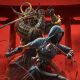 Assassin's Creed Shadows key art showing Naoe and Yasuke drawing weapons and standing side by side, against a red background