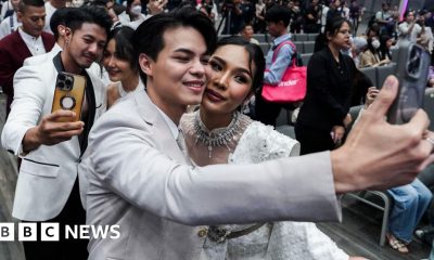 Couples wed in a riot of colour as same-sex marriage becomes legal