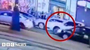 Moment pick-up truck enters busy street on New Year's Day