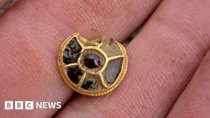 King's Lynn detectorist unearths warrior's gold scabbard stud