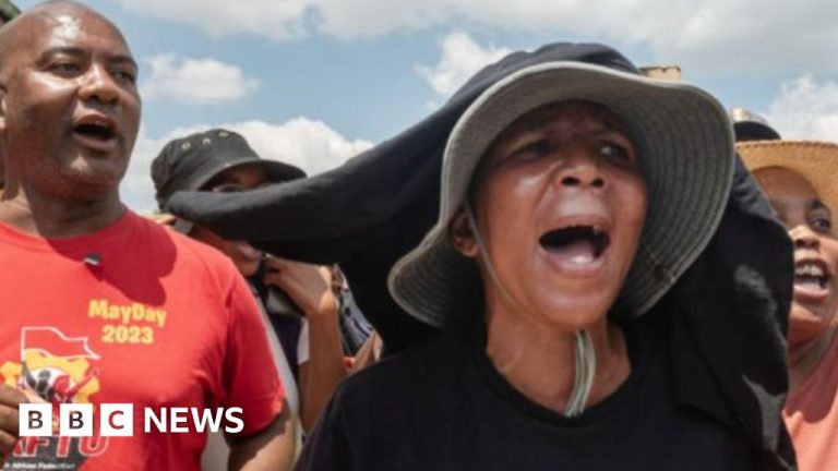 Relatives wait for news as body bags hauled from shaft