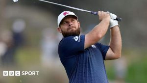 Dubai Desert Classic: Tyrrell Hatton holds off Daniel Hillier to win