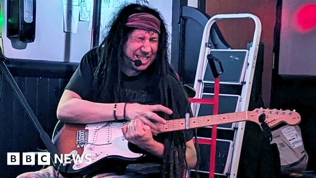 'I've learned to play guitar with one arm after a stroke'