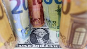 Dollar surges against the euro and sterling