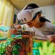 Girl wearing Meta Quest 3 headset interacting with a jungle playset