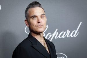 Robbie Williams attends Chopard ART Evening at the Martinez on May 23, 2023 in Cannes, France.