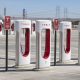 KETTLEMAN CITY, CA - JUNE 19: A deserted array of Tesla charging stations is viewed at 9 a.m. on June 19, 2024 in Kettleman City, California. Kettleman City offers fast food and an excess of Tesla electrical charging stations for travelers on Interstate 5 between Los Angeles and the San Francisco Bay Area. (Photo by George Rose/Getty Images)