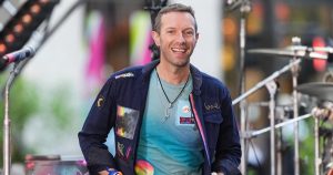 Chris Martin and Dakota Johnson Visit Temple in India, Squash Rumors