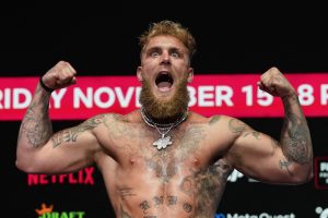 US boxer, actor and YouTuber Jake Paul gestures during his weigh-in ahead of his heavyweight boxing match against Former US heavyweight boxing champion Mike Tyson in Irving, Texas, on November 14, 2024.