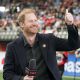 Prince Harry acknowledges fans prior to the start of a TV interview during pre-game festivities before the start of the 2024 Grey Cup at BC Place on November 17, 2024 in Vancouver, Canada.