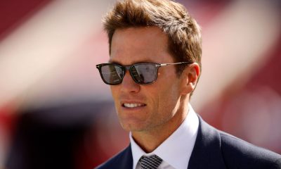 TAMPA, FLORIDA - JANUARY 05: Broadcaster Tom Brady looks on during warm ups prior to the game between the New Orleans Saints and the Tampa Bay Buccaneers at Raymond James Stadium on January 05, 2025 in Tampa, Florida. (Photo by Mike Ehrmann/Getty Images)