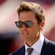 TAMPA, FLORIDA - JANUARY 05: Broadcaster Tom Brady looks on during warm ups prior to the game between the New Orleans Saints and the Tampa Bay Buccaneers at Raymond James Stadium on January 05, 2025 in Tampa, Florida. (Photo by Mike Ehrmann/Getty Images)