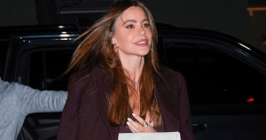 Sofia Vergara Embraces Winter Fashion in Plunging Burgundy Pantsuit