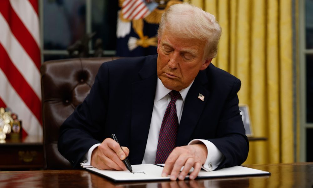 U.S. President Donald Trump signs executive orders