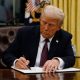 U.S. President Donald Trump signs executive orders