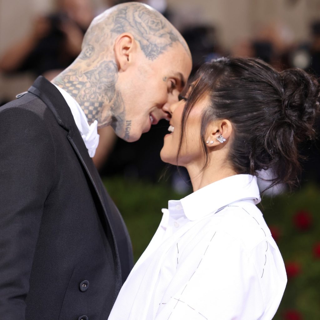 Kourtney Kardashian & Travis Barker Kick-Off the New Year With PDA