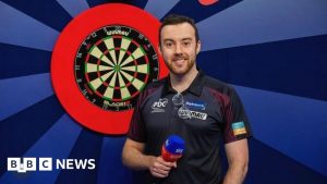 Darts referee makes history as first openly gay man to officiate