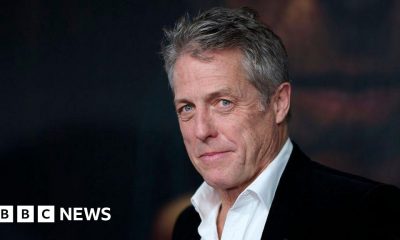 Hugh Grant calls for police to investigate Sun owners