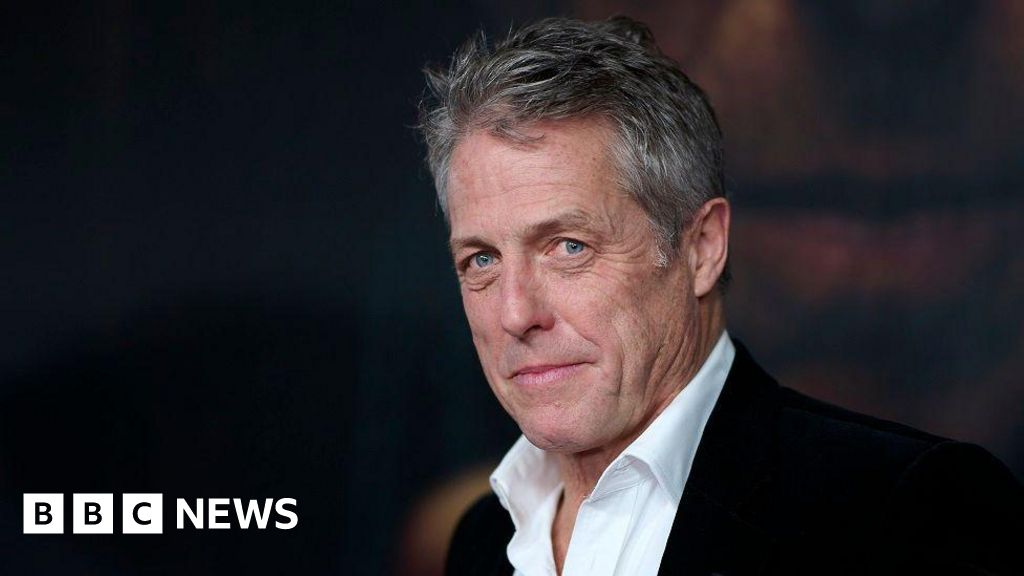 Hugh Grant calls for police to investigate Sun owners