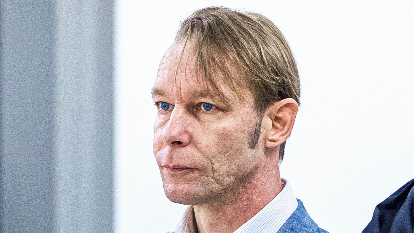 A man, who is a suspect in the disappearance of British toddler Madeleine McCann in Portugal, stands next to his lawyer Friedrich Fuelscher at his trial on unrelated sexual assault charges in Braunschweig, Germany, October 2, 2024. Christian B., is charged with three counts of aggravated rape and two counts of sexual abuse of children in Portugal between June 2007 and December 2000. Moritz Frankenberg/Pool via REUTERS