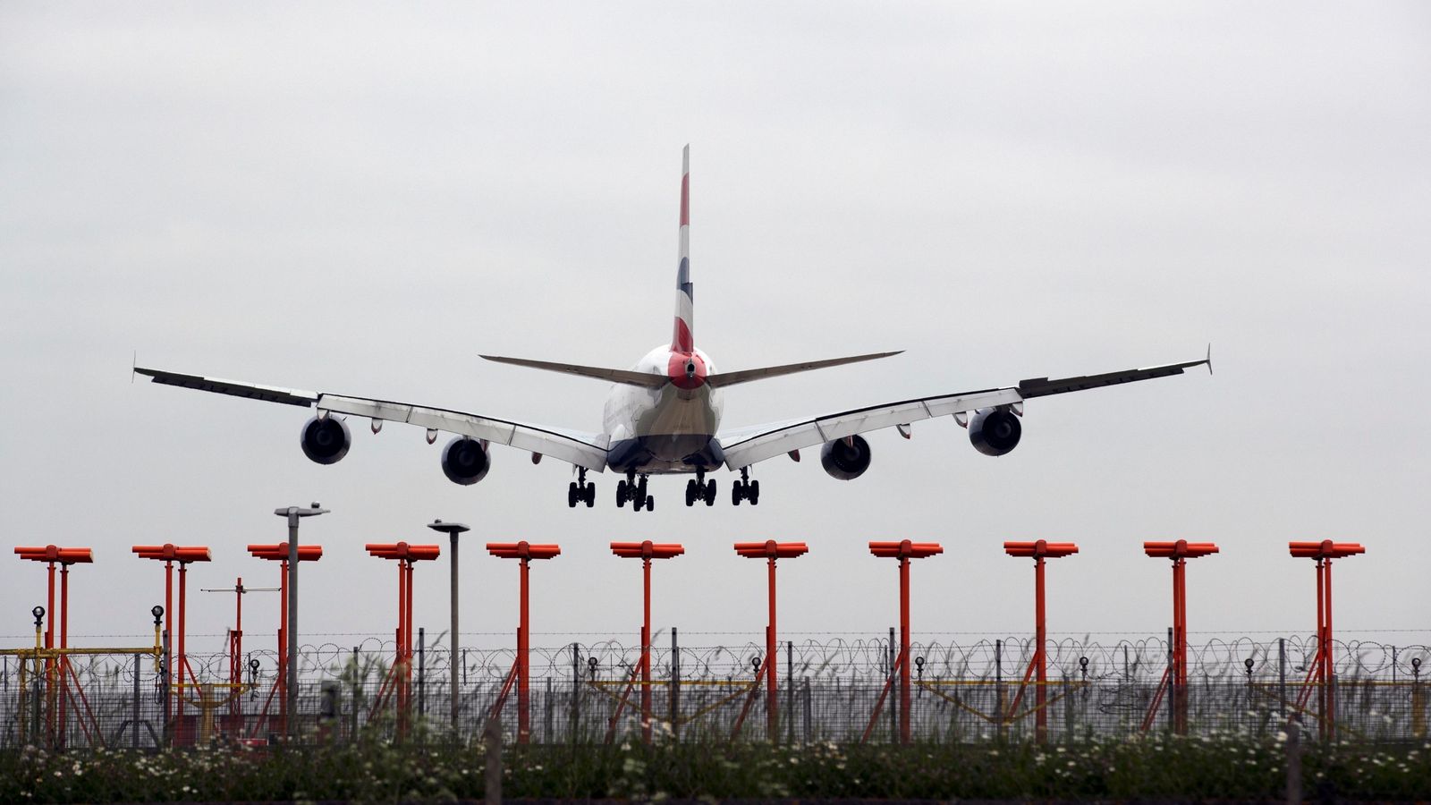 A plane lands on a runway at Heathrow airport. Pic: PA