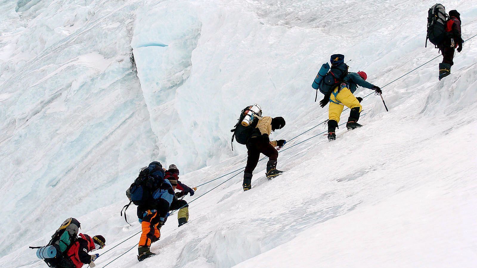 An expedition team climbing Mount Everest. Pic: AP