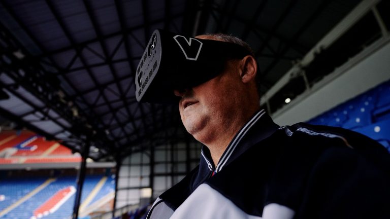 ‘Complete buzz’: Headset allows visually impaired football fan to watch Premier League games | UK News