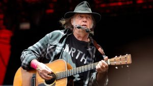 Canadian singer-songwriter Neil Young performs at the Orange Stage at the Roskilde Festival in Roskilde, Denmark, on July 1, 2016. Scanpix Denmark/Nils Meilvang/via REUTERS ATTENTION EDITORS - THIS IMAGE WAS PROVIDED BY A THIRD PARTY. FOR EDITORIAL USE ONLY. DENMARK OUT. NO COMMERCIAL SALES