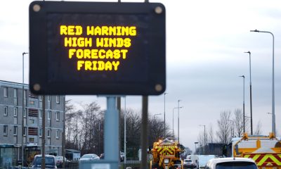 A road sign displaying a red weather warning for Friday on Calder Road, Edinburgh. Forecasters are warning of flying debris resulting in danger to life, as well as "very dangerous" driving conditions because of fallen trees as dangerous conditions are expected with the top level red warning for wind issued for Northern Ireland and parts of Scotland across Friday morning. The Met Office has issued weather warnings across the UK, but the worst of Storm Eowyn is expected to strike across the island