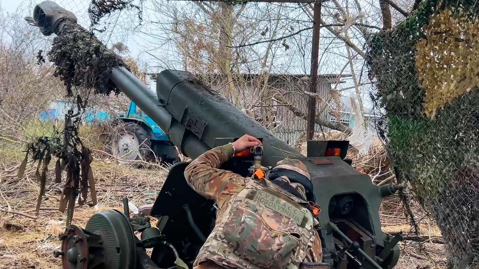 A Russian serviceman aims a howitzer towards Ukrainian positions in the Kursk border region of Russia. Pic: Russian Defence Ministry/AP