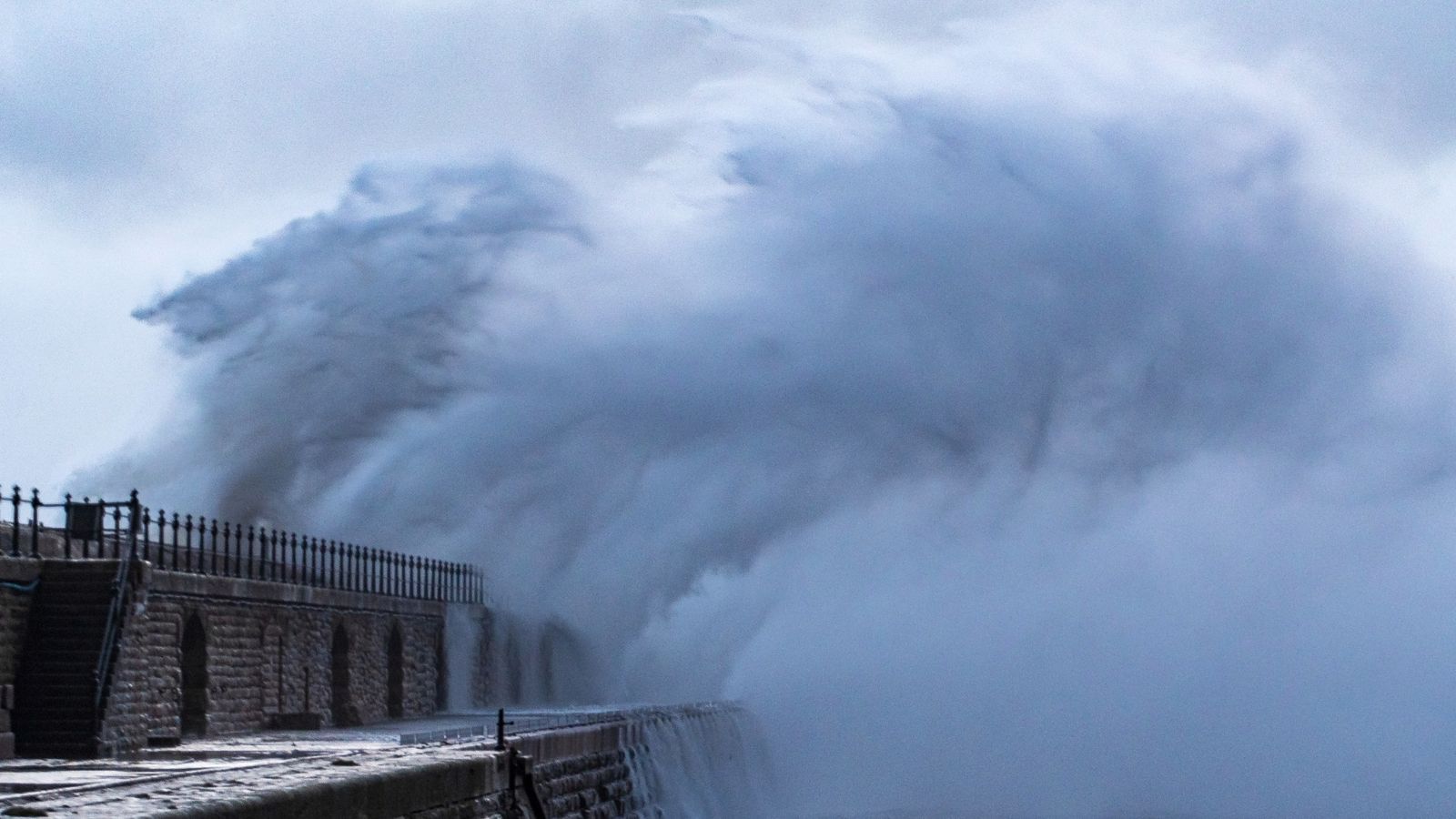 Waves crash over Tynemouth Pier during Storm Darragh in December. Pic: AP