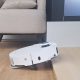 Dreame X50 Ultra Complete robot vacuum lifting up as it approaches a step