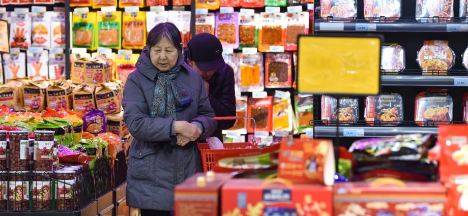China's consumer inflation at 5-month high, producer deflation persists